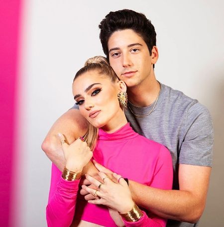 Milo Manheim and Meg Donnelly hugged as they took a picture.